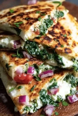 Mediterranean Quesadillas with Spinach, Feta, Mozzarella, and Red Onion
